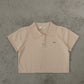 avocado - Lilo Knit Polo เสื้อโปโลครอป  แต่งดีเทลกระดุมเหล็ก